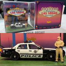 Load image into Gallery viewer, Rollin 1/64 Las Vegas Metro Police Ford Crown Victoria with diorama and hand painted officer figure
