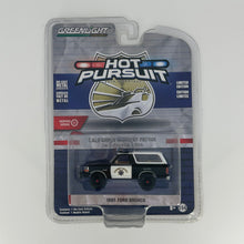 Load image into Gallery viewer, Greenlight 1/64 Hot Pursuit Series 35 - 1995 Ford Bronco - California Highway Patrol CHP
